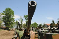 PLA soldiers operating vehicle-mounted guns in drill