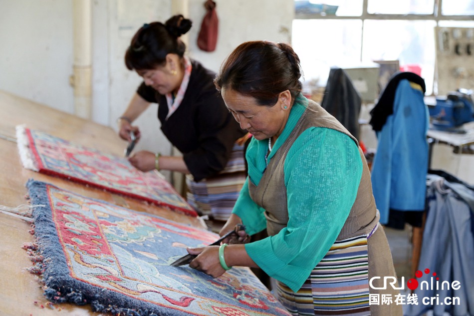 Legend on fingertip: the birth of a Tibetan carpet