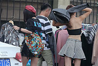 Models change clothes on street in Hangzhou