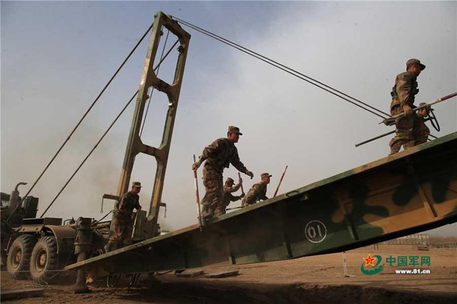 Engineer troop builds bridge in real combat conditions