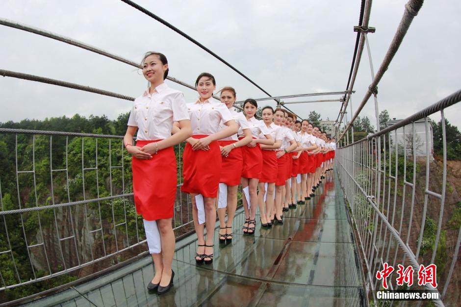 Etiquette training on all-glass suspension bridge