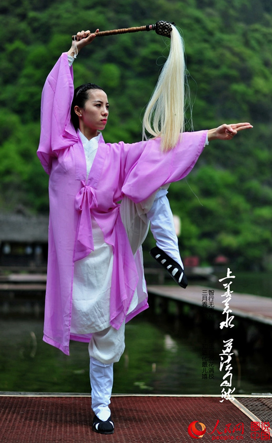 Enthusiasts perform Kung Fu at Wudang Mountain