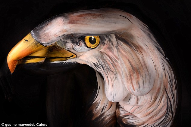 Naked models transformed into landscapes, birds and even DRAGONS by body painting artist