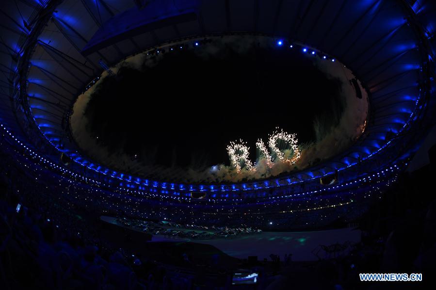 Rio opens Olympics with colors, curves and coolness