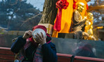 Beijing temple offers free Laba porridge to devotees and tourists alike