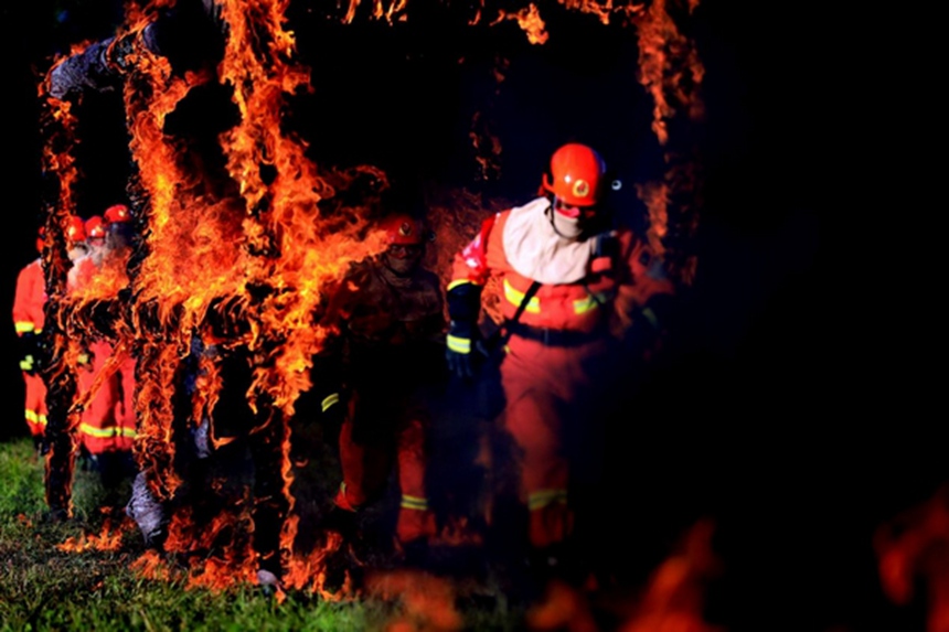 Heroes in harm's way: forest firefighters carry out rescue tasks in NE China's Heilongjiang