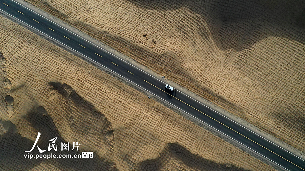 Expressway running across desert to open to traffic in China’s Xinjiang