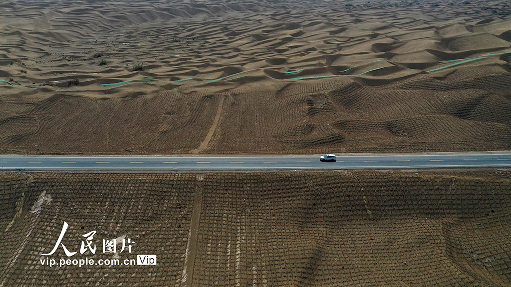 Expressway running across desert to open to traffic in China’s Xinjiang