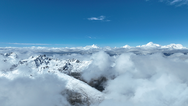 Spectacular views emerge after snowfall at Baima Snow Mountain