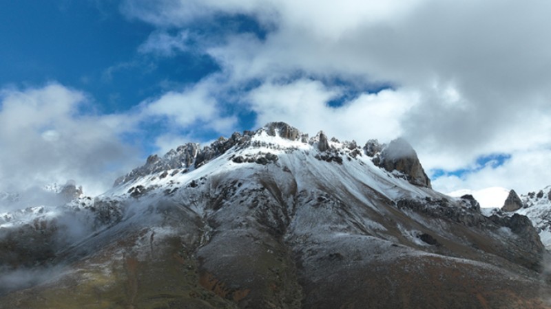 Spectacular views emerge after snowfall at Baima Snow Mountain