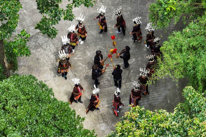 Sexagenarian couple safeguard millennia-old traditional dance in SW China's Guizhou