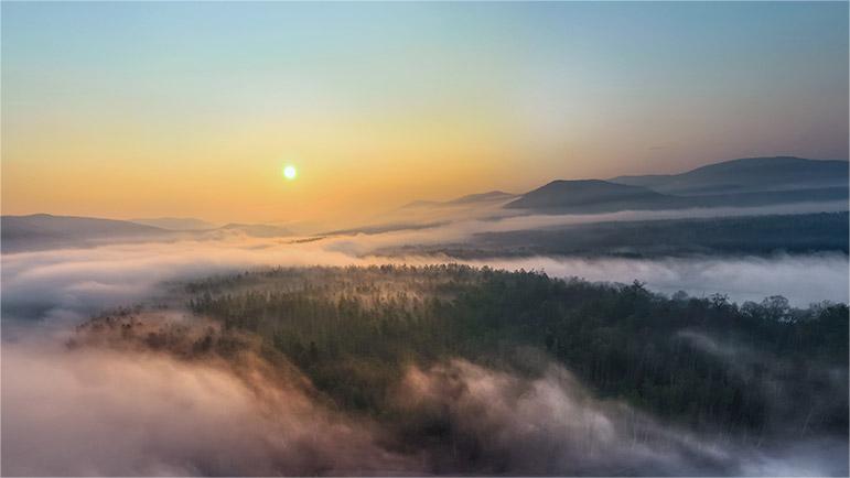 Breathtaking sunrise at the Greater Khingan Mountains, NE China's Inner Mongolia