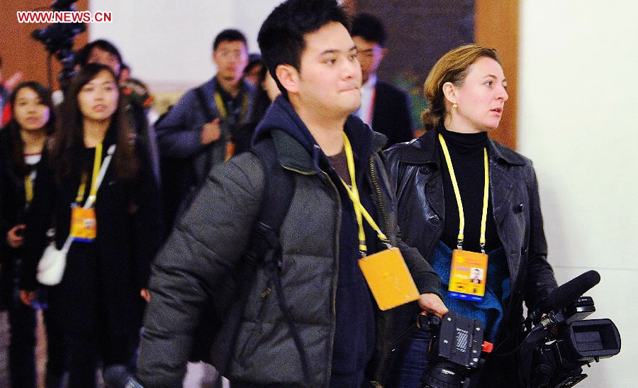 Journalists prepare to report the closing session of the 18th National Congress of the Communist Party of China (CPC) at the Great Hall of the People in Beijing, capital of China, Nov. 14, 2012. (Xinhua/Zhang Yan)