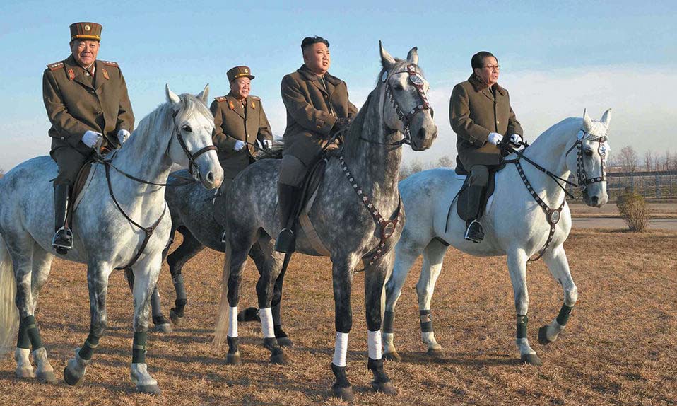 DPRK's top leader Kim Jong Un inspects the training ground of horse riding company of KPA on Nov. 19, 2012. (Photo/ People's Daily Online)