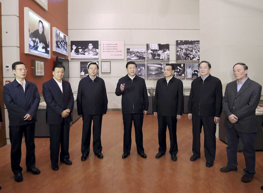 Xi Jinping, general secretary of the Communist Party of China (CPC) Central Committee, views "The Road Toward Renewal" exhibition in Beijing Thursday,  along with other members of the Standing Committee of the CPC Central Committee Political Bureau.(Ju Peng/Xinhua)