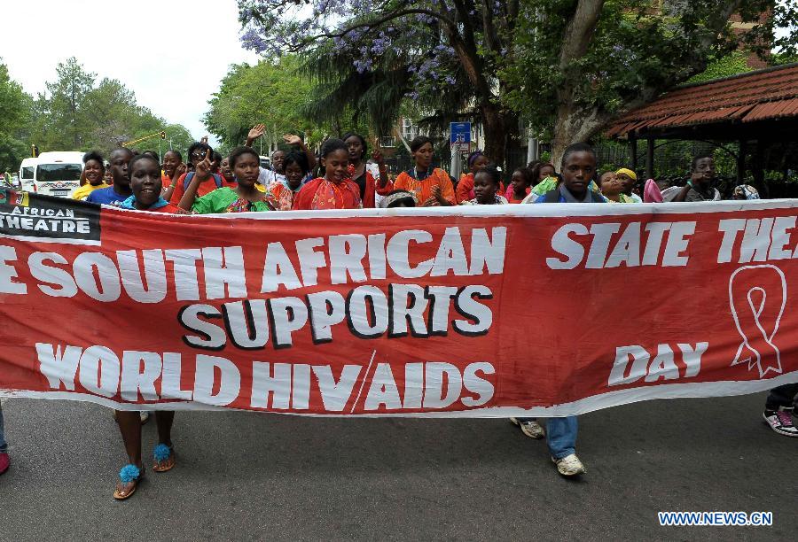 South African students attend an activity to mark the 25th World AIDS Day in South Africa's administrative capital of Pretoria, Dec. 1, 2012. (Xinhua/Li Qihua)