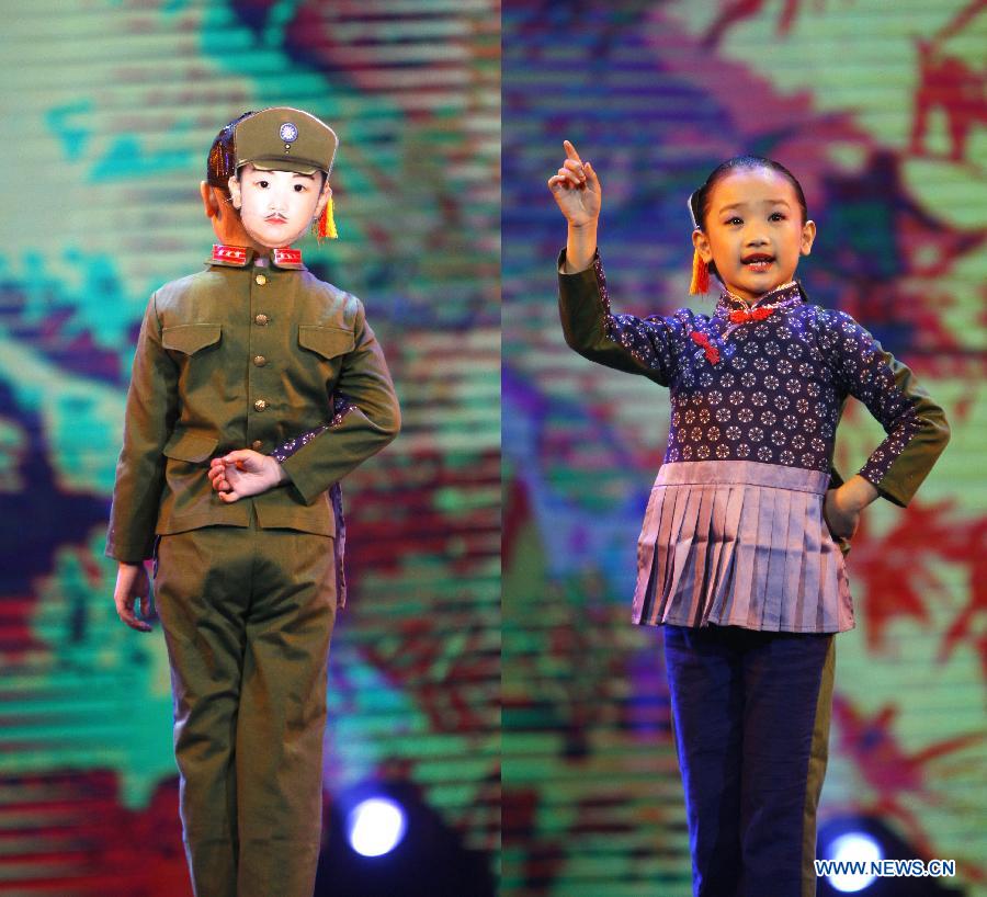 Middle school students perform during the awarding ceremony of a Chinese opera contest for students at the National Academy of Chinese Theatre Arts in Beijing, capital of China, Dec. 2, 2012. About 2,000 students participated in the contest. (Xinhua/Duan Zhuoli)  