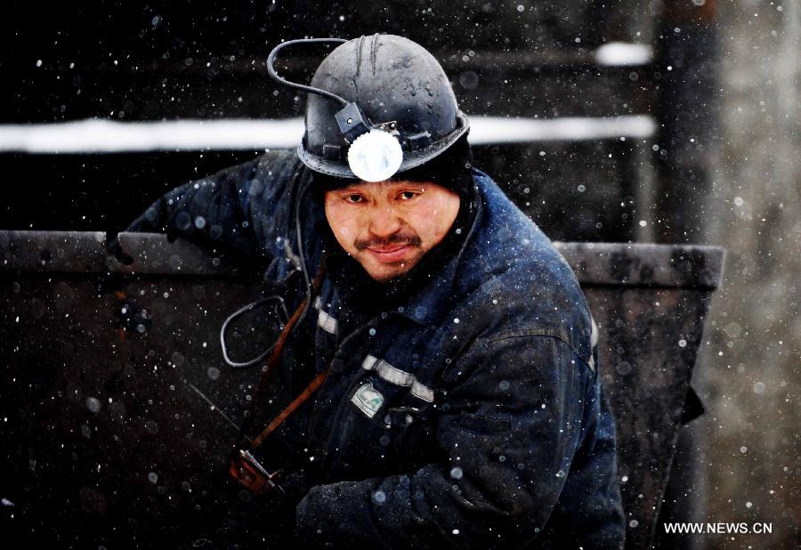 A rescuer gets out of the flooded Furuixiang Coal Mine in Qitaihe City, northeast China's Heilongjiang Province, Dec. 4, 2012. (Xinhua/Qin Cunguang)