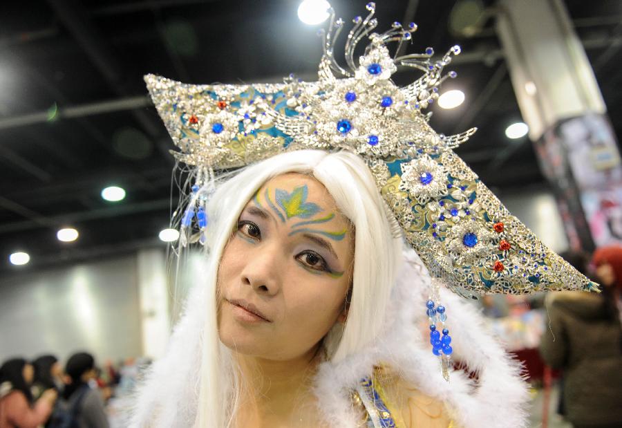 A cosplayer poses for photo during the 1st Cosplay Cultural Festival in Hangzhou, capital of east China's Zhejiang Province, Dec. 9, 2012. The two-day festival closed on Sunday. (Xinhua/Han Chuanhao) 