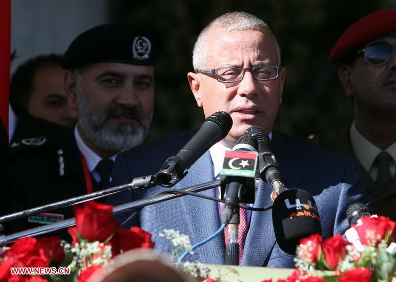 Libyan Prime Minister Ali Zaidan delivers a speech during a ceremony to mark the 61st anniversary of Independence Day at Martyrs' Square in Tripoli, Libya, Dec. 24, 2012. (Xinhua/Hamza Turkia)