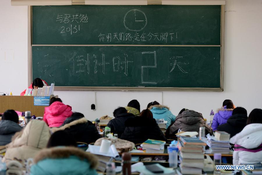 Students prepare for the upcoming National Entrance Examination for Postgraduate (NEEP) at a classroom in Anhui University in Hefei, capital of east China's Anhui Province, Jan. 2, 2013. Examinees taking the NEEP scheduled on Jan. 5 have rocketed up to 1.8 million this year, hitting an all-time high. (Xinhua/Zhang Rui) 