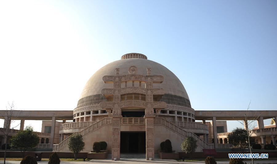 Photo taken on Dec. 31, 2012 shows the Indian-style Buddha hall of the Baima Temple, or the White Horse Temple, in Luoyang City, Central China's Henan Province. Visitors can see Buddha halls with different styles of foreign countries at the Baima Temple, the oldest Buddhist temple in China.(Xinhua/Li Bo) 