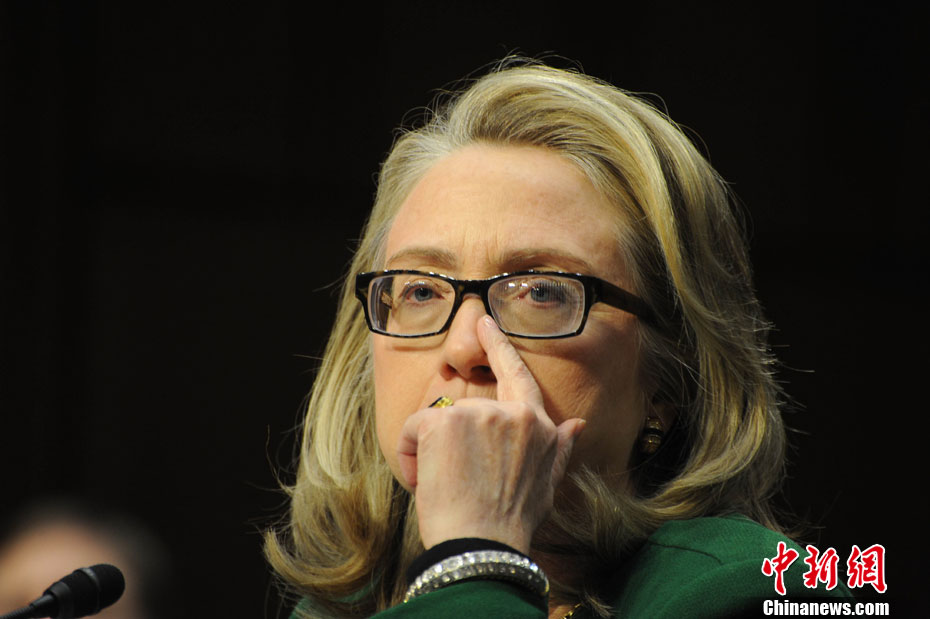 U.S. Secretary of State Hillary Clinton testifies about the September attacks on the U.S. diplomatic mission in Benghazi, Libya, on Capitol Hill, U.S., Jan. 23, 2013. It was the last time Clinton attended the Congressional hearing as the U.S. top diplomat. After the heated inquires from the House of Representatives and the Senate, the "Iron lady" rarely let herself cry, smile and be angered, which has shown different sides of her nature.(Chinanews.cn/Wu Qingcai)