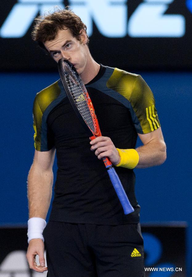 Andy Murray of Britain reacts during the men's singles semifinal match against Roger Federer of Switzerland at the 2013 Australian Open tennis tournament in Melbourne, Australia, Jan. 25, 2013. Murray won 3-2 to enter the final. (Xinhua/Bai Xue) 