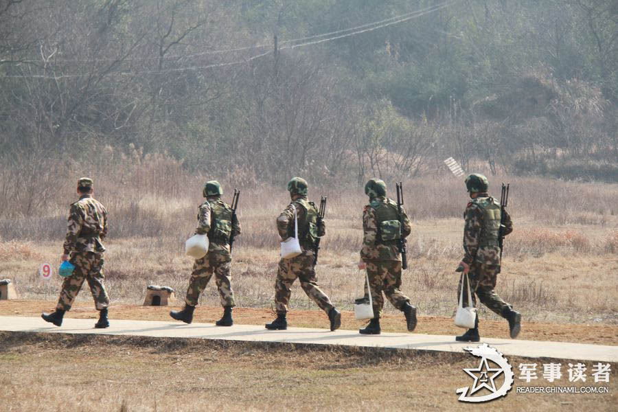 Snipers of the Huzhou Detachment under the Zhejiang Contingent of the Chinese People's Armed Police Force (APF) carry out military training before Spring Festival. (China Military Online/He Yuanhong, Wang Shichun)