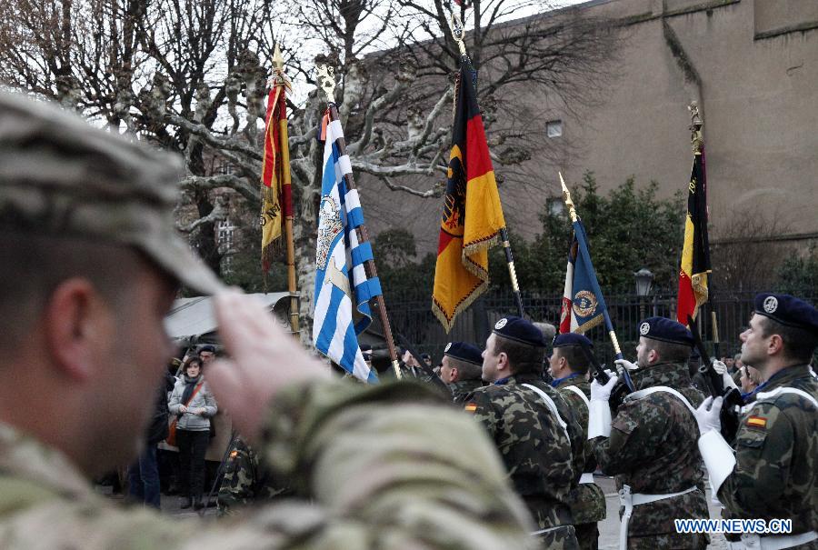 Soldiers salute at the ceremony marking the end of Eurocorps' intervention in Afghanistan in Strasbourg, France, Jan. 31, 2013. The Eurocorps held a ceremony marking the end of its intervention in Afghanistan on Thursday in Strasbourg. (Xinhua/Wang Xiaojun)