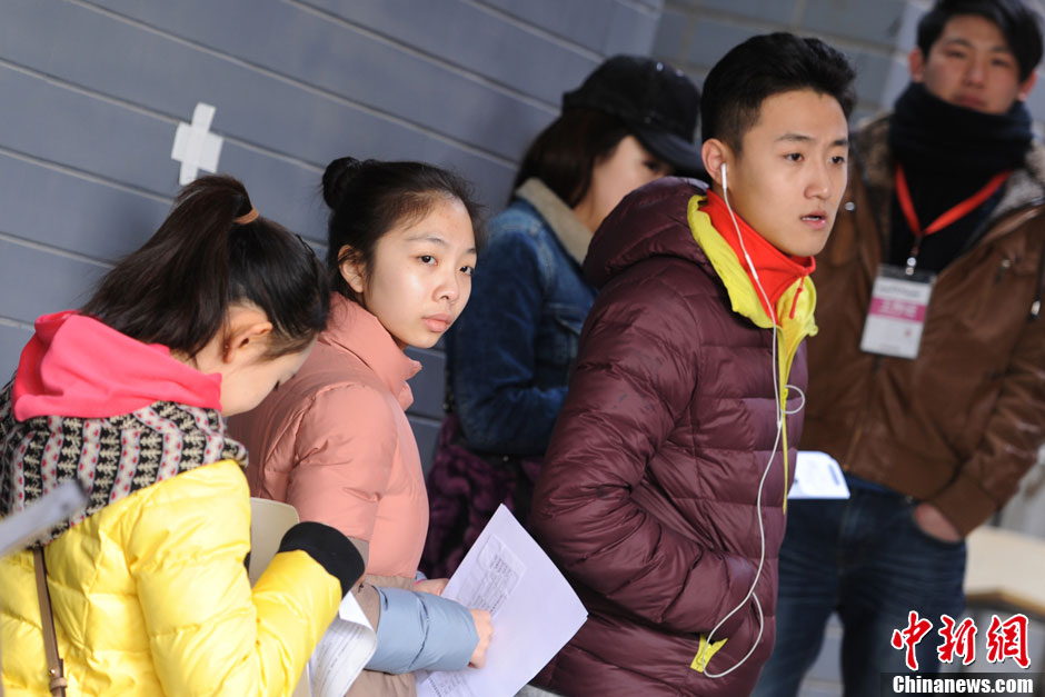 The photo shows the enrollment site of Beijing Film Academy on Feb. 18, 2013. Beijing Film Academy plans to recruit 513 new students in 25 professional directions in 2013. Candidates should first submit online application and confirm on site. The online application has started since Jan. 10, 2013. The registration confirmation started on Feb. 17, 2013. (Photo/Chinanews) 