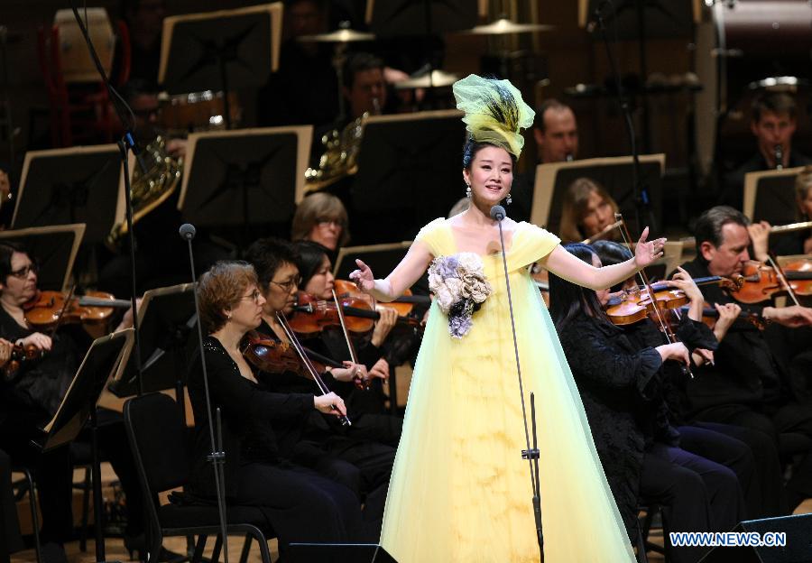 Famous Chinese singer Song Zuying performs during the "Cultures of China, Festival of Spring" performance in Washington D.C., capital of the United States, Feb. 19, 2013. A special concert is dedicated to Song Zuying in this year's "Cultures of China, Festival of Spring" event in the United States from Feb. 16 to March 3.(Xinhua/Fang Zhe)