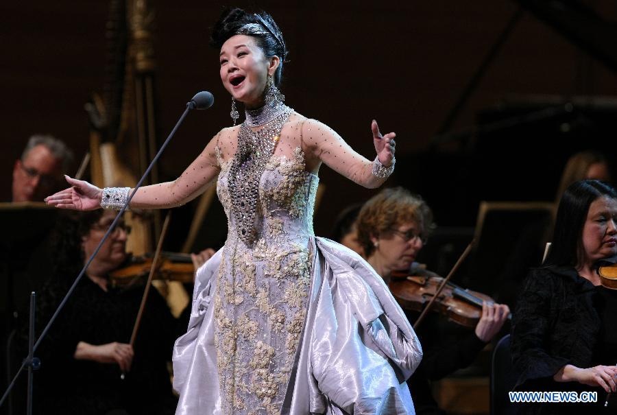 Famous Chinese singer Song Zuying performs during the "Cultures of China, Festival of Spring" performance in Washington D.C., capital of the United States, Feb. 19, 2013. A special concert is dedicated to Song Zuying in this year's "Cultures of China, Festival of Spring" event in the United States from Feb. 16 to March 3.(Xinhua/Fang Zhe)