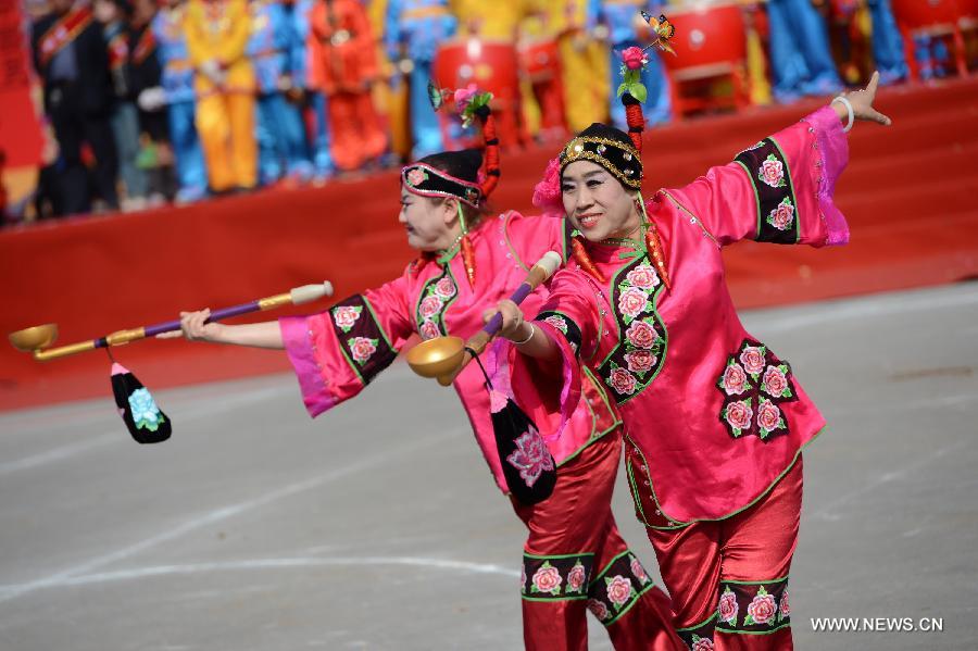 Performers take part in a Shehuo parade in Longxian County, northwest China's Shanxi Province, Feb. 22, 2013. The performance of Shehuo can be traced back to ancient rituals to worship the earth, which they believe could bring good harvests and fortunes in return. Most Shehuo performances take place around traditional Chinese festivals, especially the Spring Festival and the Lantern Festival. (Xinhua/Li Yibo)