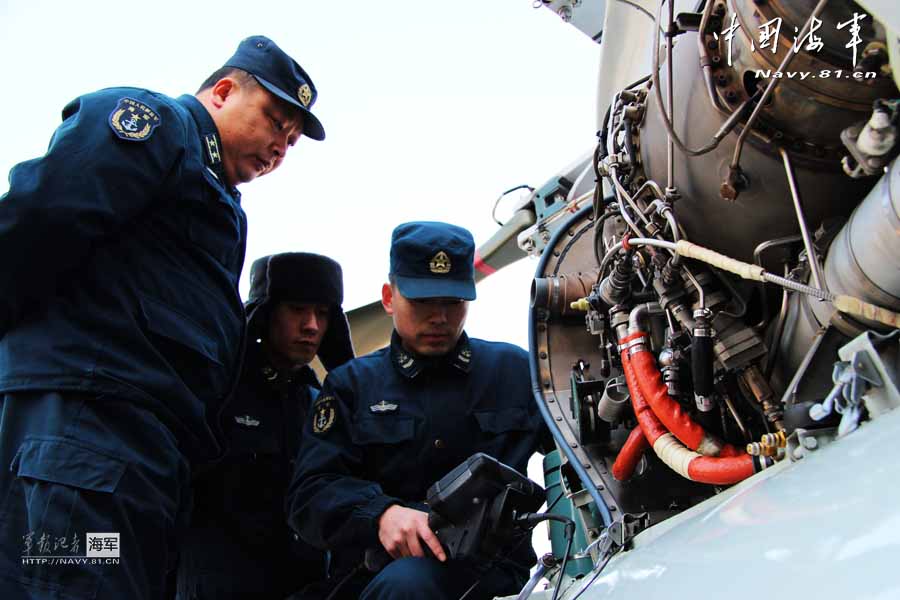 A carrier-based aircraft regiment under the Navy of the Chinese People's Liberation Army (PLA) conducts flight training after the Spring Festival on February 19, 2013. They not only completed the flight training subjects, but also made comprehensive maintenance and inspection to the airfield road, support vehicles, and the communication facilities. (navy.81.cn/Hu Baoliang, Zhang Wei, Zhang Yinjie)