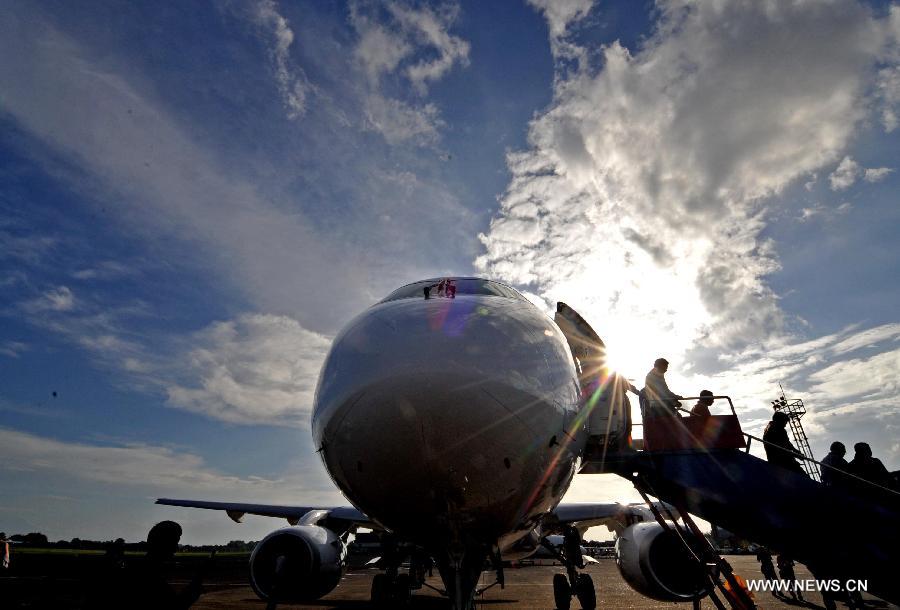 A Russian-made commercial plane Sukhoi Super Jet 100 (SSJ 100) lands at Halim Perdana Kusuma Airport in Jakarta, Indonesia, Feb. 28, 2013. An Indonesian airlines firm, Sky Aviation, received on Wednesday the initial delivery of SSJ 100, expecting five to join the fleet by the end of this year. (Xinhua/Agung Kuncahya B.)