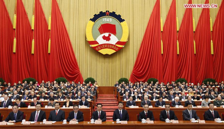 Hu Jintao, Xi Jinping, Wu Bangguo, Wen Jiabao, Jia Qinglin, Li Keqiang, Zhang Dejiang, Liu Yunshan, Wang Qishan and Zhang Gaoli sit on the platform during the opening meeting of the first session of the 12th National Committee of the Chinese People's Political Consultative Conference (CPPCC) at the Great Hall of the People in Beijing, capital of China, March 3, 2013. The first session of the 12th CPPCC National Committee opened in Beijing on March 3. (Xinhua/Ju Peng)