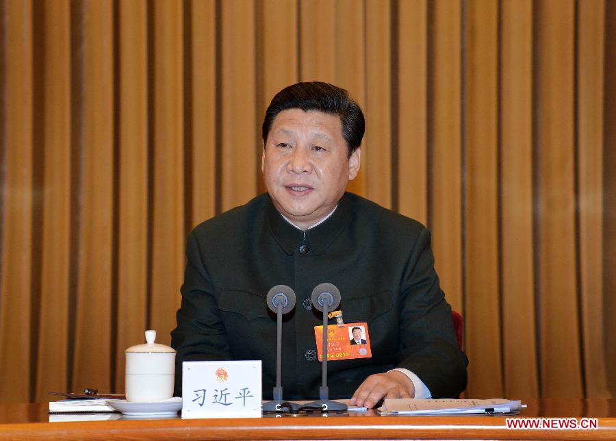 Xi Jinping, general secretary of the Central Committee of the Communist Party of China (CPC) and chairman of the CPC Central Military Commission, delivers an important speech while attending a plenary meeting of the People's Liberation Army (PLA) deputies who attend the first session of the 12th National People's Congress (NPC) in Beijing, capital of China, March 11, 2013. (Xinhua/Li Gang)