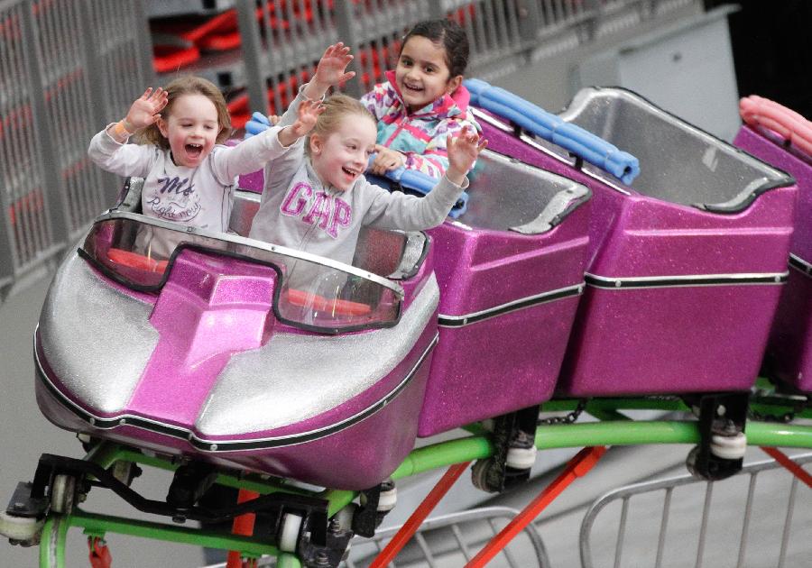 Children enjoy their day at the Playdome carnival held at BC Place stadium in Vancouver, Canada. March 16, 2013. (Xinhua/Liang Sen) 