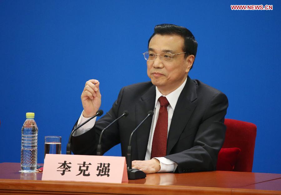 Chinese Premier Li Keqiang speaks at a press conference after the closing meeting of the first session of the 12th National People's Congress (NPC) at the Great Hall of the People in Beijing, capital of China, March 17, 2013. Chinese Premier Li Keqiang and Vice Premiers Zhang Gaoli, Liu Yandong, Wang Yang and Ma Kai met the press and answered questions here on Sunday. (Xinhua/Chen Jianli)