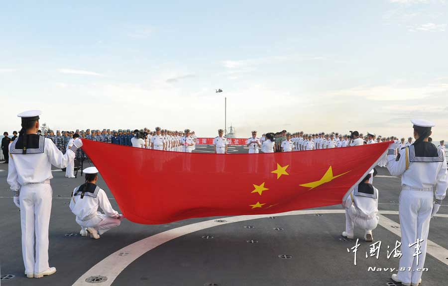 The combat-readiness cruise and high-sea training taskforce under the South China Sea Fleet of the Navy of the Chinese People’s Liberation Army (PLA) arrived at the waters off the Zengmuansha Reef of the Nansha Islands and held a grand oath-taking ceremony on March 26, 2013.(chinamil.com.cn/Qian Xiaohu and Song Xin)