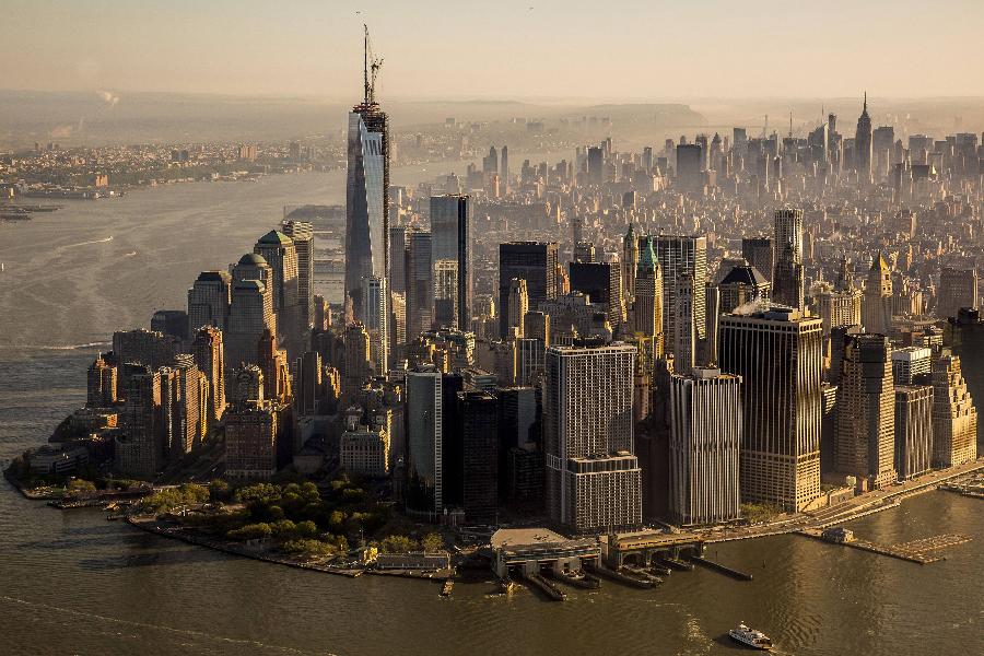 The final piece of the One World Trade Center spire was attached to the building by ironworkers in New York May 10, 2013. The tower now rises to a symbolic 1,776 feet, making it the tallest building in the western hemisphere.(Xinhua/Reuters Photo)