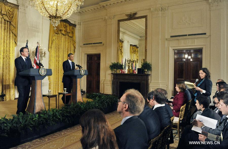 U.S. President Barack Obama (2nd L) attends a joint press conference with British Prime Minister David Cameron following their talks at the White House in Washington D.C. on May 13, 2013. (Xinhua/Fang Zhe) 