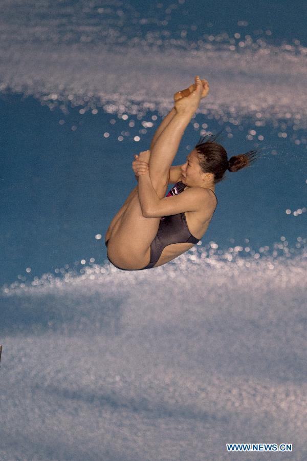 Chinese diver He Zi competes in the women's 3m springboard single semifinals during the fifth stage of the Diving World Series of International Swimming Federation (FINA) in Guadalajara, Jalisco, Mexico, on May 18, 2013. (Xinhua/Alejandro Ayala)