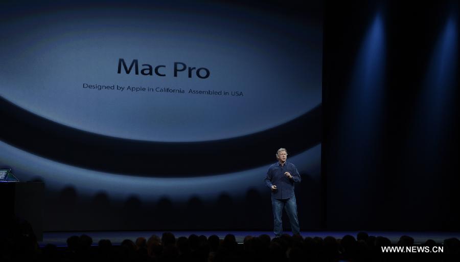 Apple Senior Vice President of Worldwide product marketing, Phil Schiller, addresses the 2013 Apple WWDC at the Moscone Center in San Francisco, California, the United States, on June 10, 2013. (Xinhua)