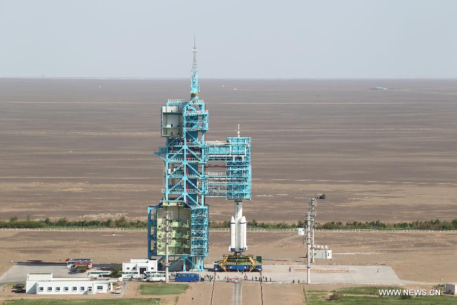 The manned Shenzhou-10 spacecraft is ready for the launch at the Jiuquan Satellite Launch Center in Jiuquan, northwest China's Gansu Province, June 11, 2013. (Xinhua/Wang Jianmin)  