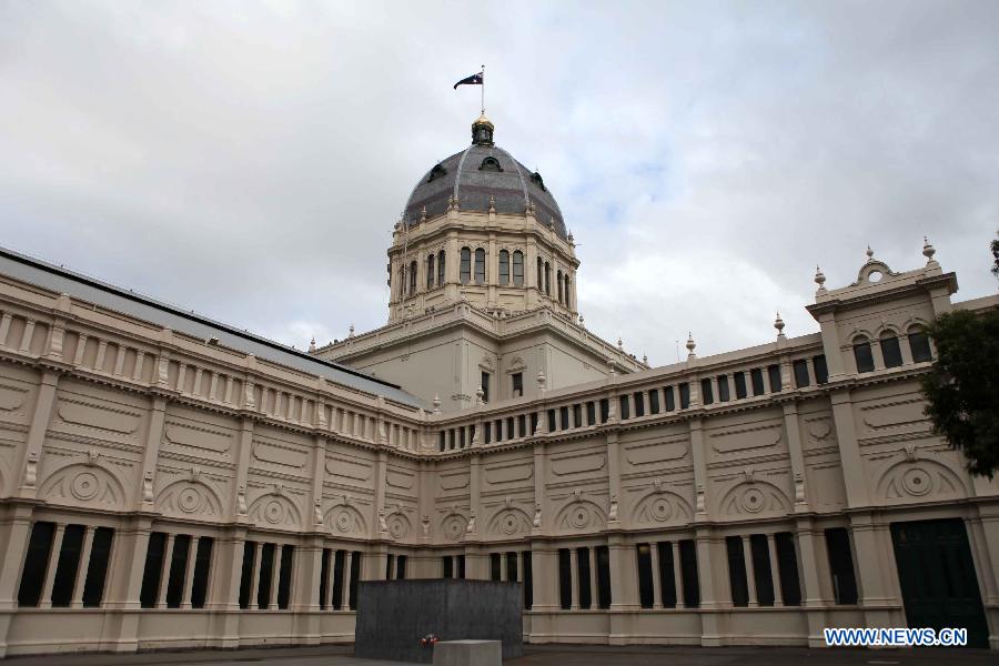 Photo taken on June 7, 2013 shows the fountain in front of the Royal Exhibition Building in Melbourne, Australia. The Royal Exhibition Building and its surrounding Carlton Gardens were designed for the great international exhibitions of 1880 and 1888 in Melbourne. The Building is constructed of brick and timber, steel and slate. It combines elements from the Byzantine, Romanesque, Lombardic and Italian Renaissance styles. The Royal Exhibition Building and Carlton Gardens were listed by United Nations Educational, Scientific and Cultural Organization (UNESCO) as a world heritage in 2004. (Xinhua/Xu Yanyan) 