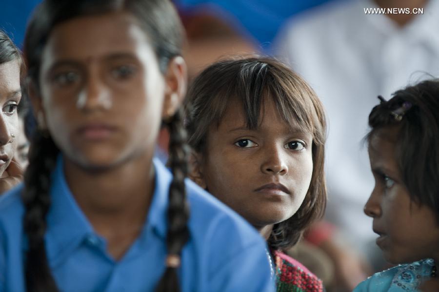 Indian rescued child laborers attend an awareness rally in Calcutta, Capital of eastern Indian state West Bengal, June 12, 2013. According to the International Labor Organization (ILO), an estimated 10.5 million children worldwide work as domestic workers. (Xinhua/Tumpa Mondal) 