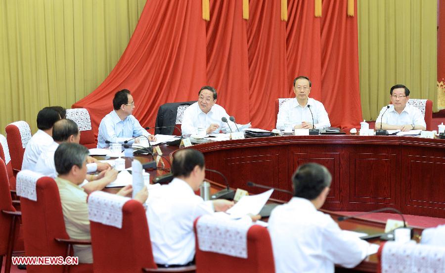 Yu Zhengsheng (3rd R back), chairman of the National Committee of the Chinese People's Political Consultative Conference (CPPCC), presides over and addresses the fourth meeting of the chairman and vice-chairpersons of the 12th CPPCC National Committee in Beijing, capital of China, June 13, 2013. (Xinhua/Li Tao)