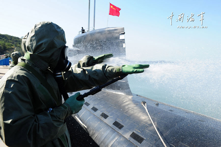 China's first maritime NBC emergency rescue team under a submarine base of the North Sea Fleet of Chinese navy conducts training in a sea area. The training subjects included real-time monitoring, sample collection and analysis and contaminated areas delineation. (China Military Online/Yu Hang, Yu Haitao)